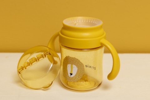 Kubek treningowy-niekapek 360° z uchwytami - Lew Trixie Baby